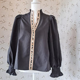 Black Ruffle Neck with Leopard Detail