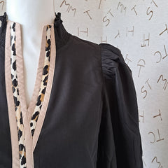 Black Ruffle Neck with Leopard Detail
