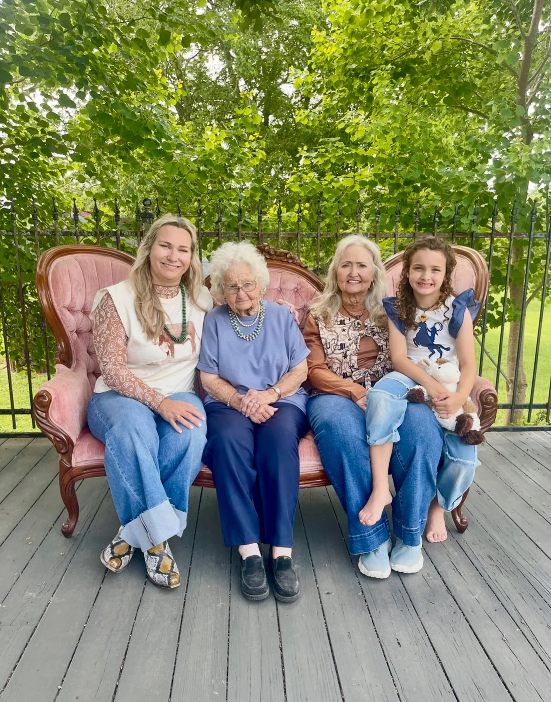 The family behind The Branding Room, four generations together on the porch